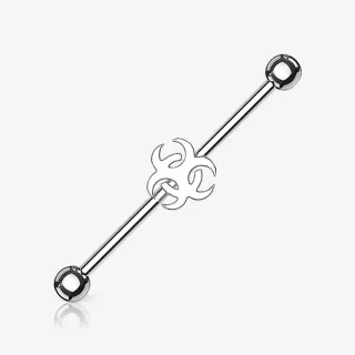 Piercing Transversal Biohazard prateado ou preto com símbolo estilizado
