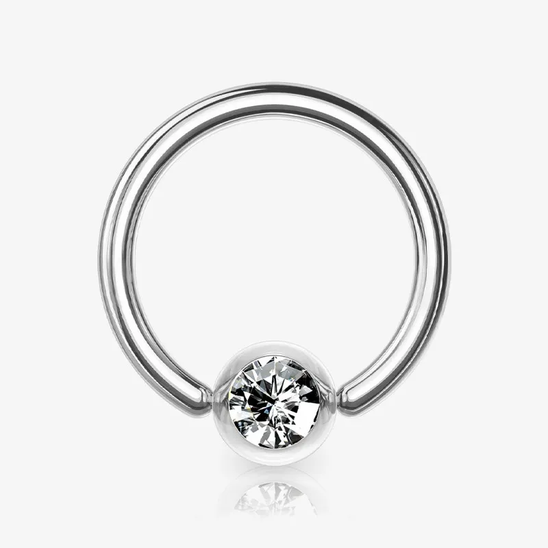 Piercing captive strass prateado em aço cirúrgico com detalhe brilhante