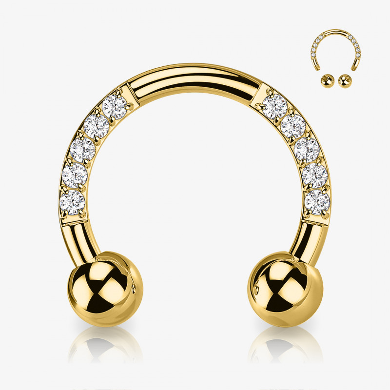 Piercing ferradura dourado com zircônias cravadas na lateral