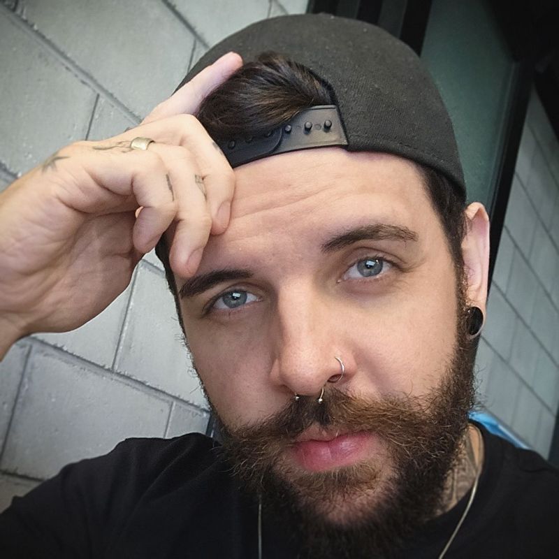 Piercing ferradura prateado com bolinha de aço | ALARGS