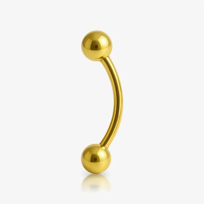 Piercing curvo dourado com bolinha em aço cirúrgico para sobrancelha