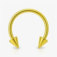 Piercing ferradura dourado em aço com spike estiloso