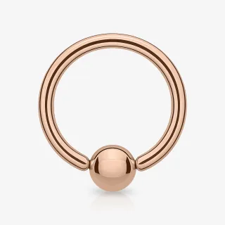 Piercing captive rosé em aço cirúrgico com bolinha rosé gold