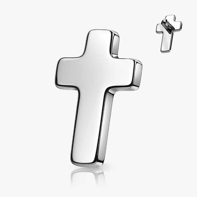 Joia microdermal em formato de cruz prateada de titânio com rosca interna.